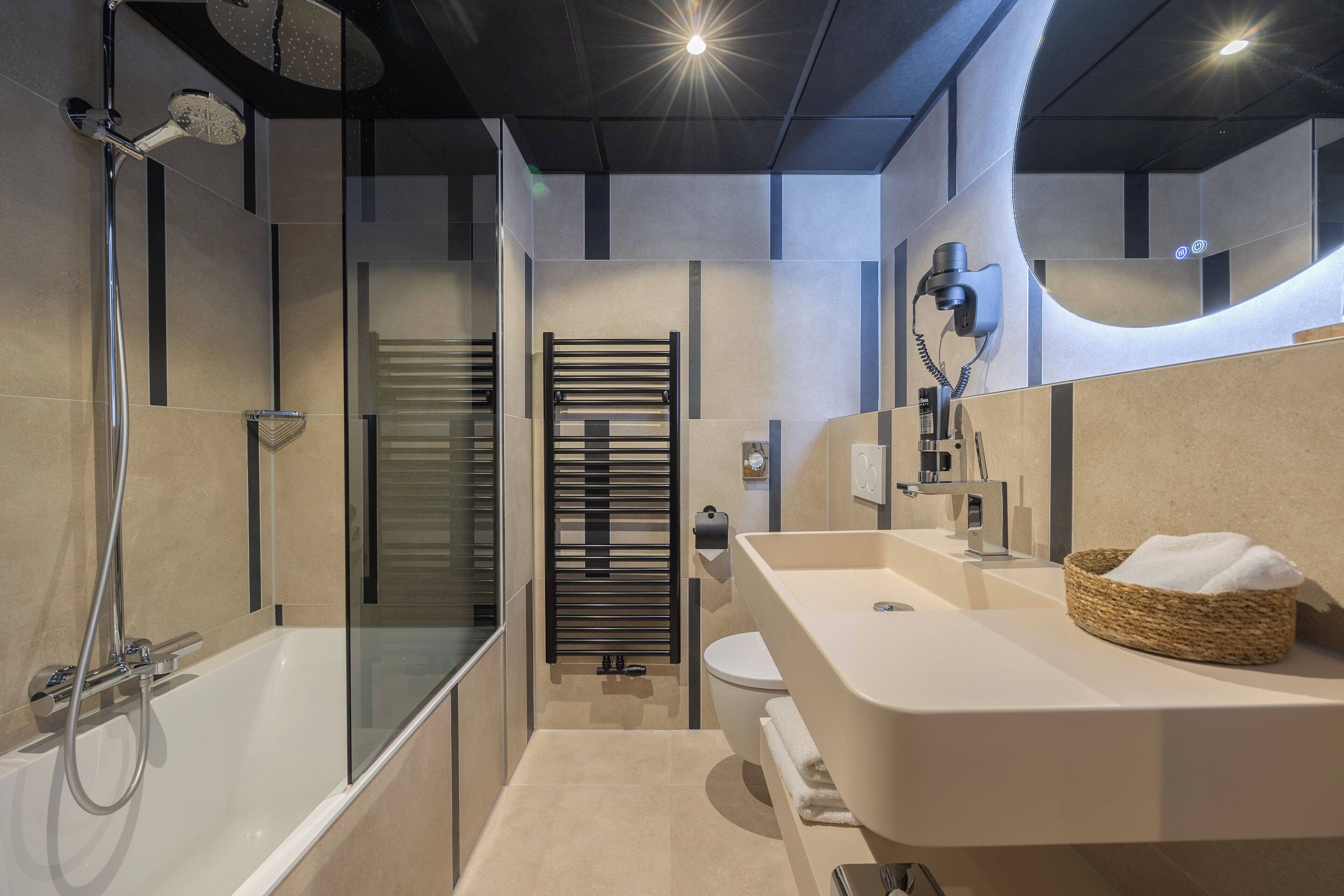 separate bathtub and shower, free toiletries, hair dryer, towels