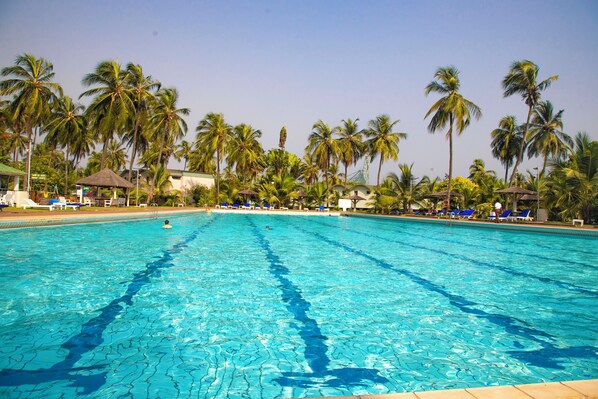 Outdoor pool, open 7 AM to 8 PM, pool umbrellas, sun loungers