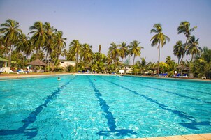 Outdoor pool, open 7 AM to 8 PM, pool umbrellas, sun loungers