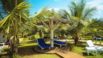 Outdoor pool, open 7 AM to 8 PM, pool umbrellas, pool loungers