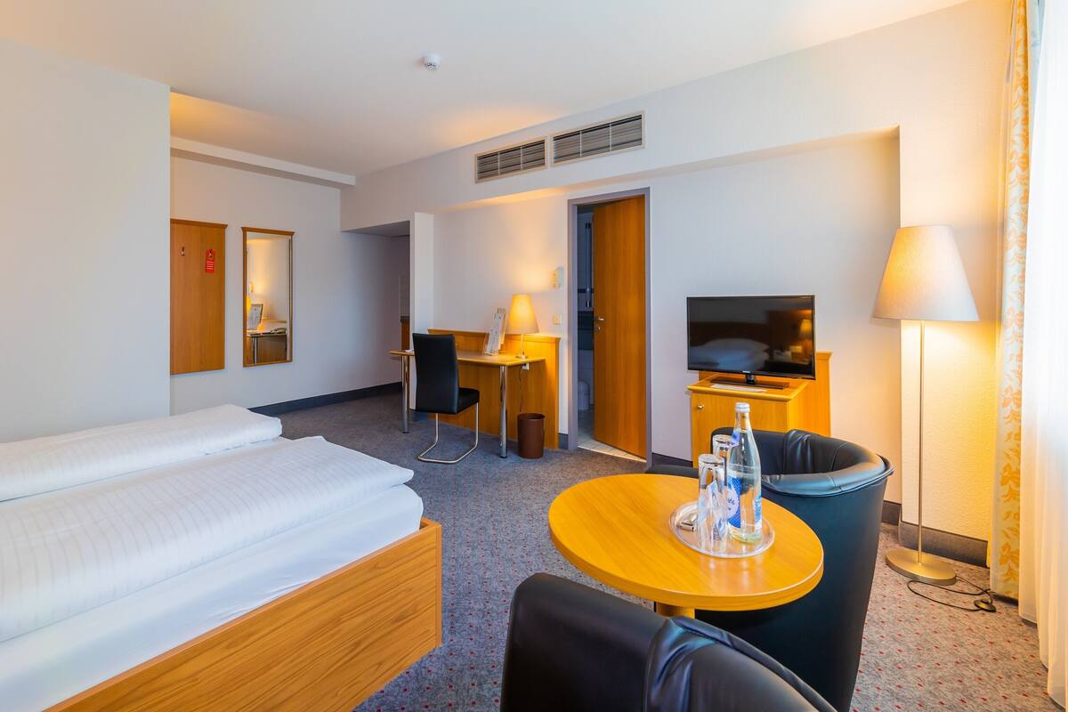 comfort double room | living area | 42-inch lcd tv with satellite channels, tv, pay films