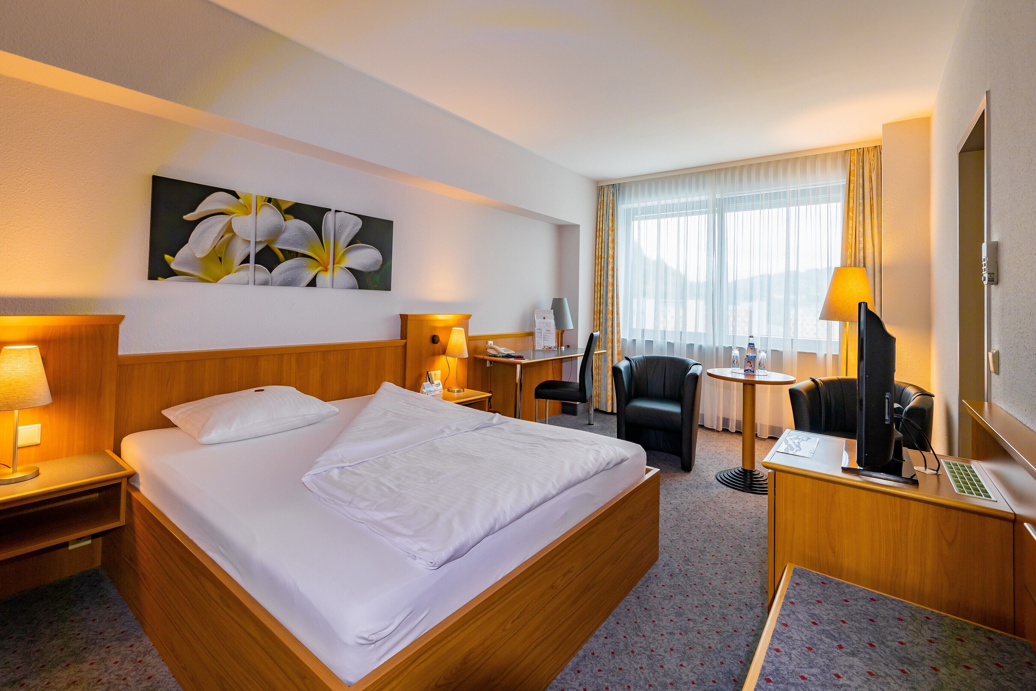 hypo-allergenic bedding, in-room safe, desk, laptop workspace