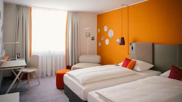 Hypo-allergenic bedding, desk, blackout drapes, soundproofing