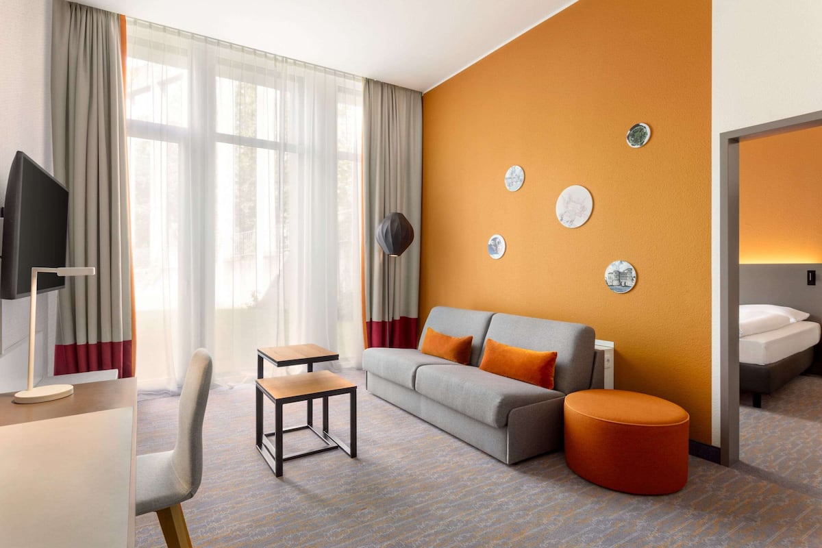 hypo-allergenic bedding, desk, blackout curtains, soundproofing