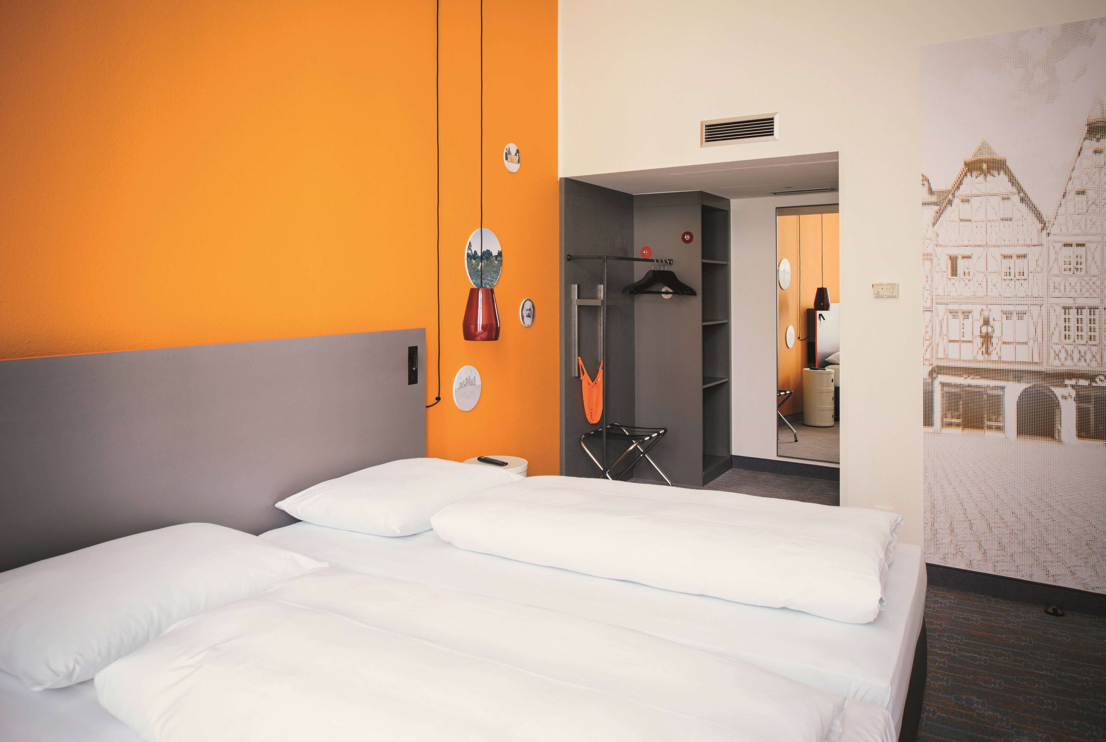 hypo-allergenic bedding, desk, blackout curtains, soundproofing