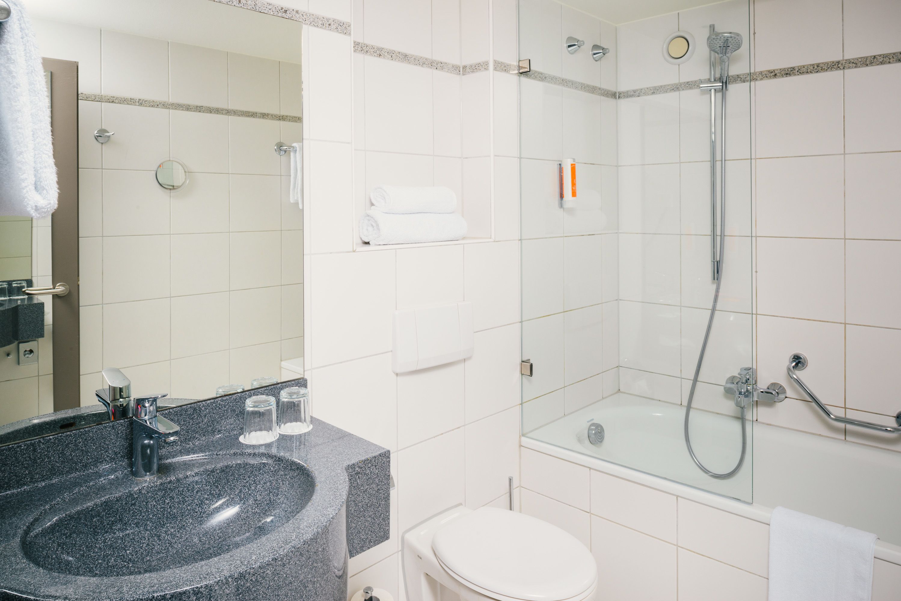 combined shower/bathtub, free toiletries, hair dryer, towels