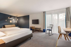 Hypo-allergenic bedding, desk, blackout drapes, soundproofing