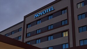 A hotel with a modern facade, multiple floors, and a prominent 'NOVOTEL' sign. - Novotel Sao Paulo Center Norte (São Paulo)