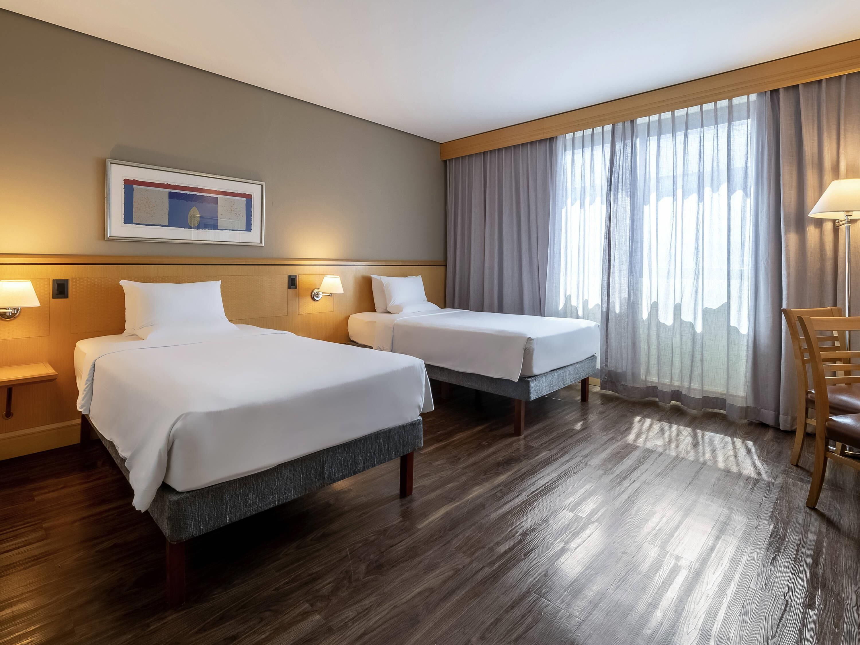 Standard Apartment, 2 Single Beds | Minibar, in-room safe, desk, blackout curtains