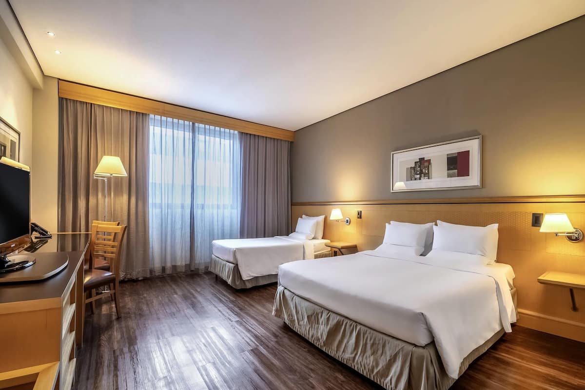 Standard Room, Multiple Beds | Minibar, in-room safe, desk, blackout drapes