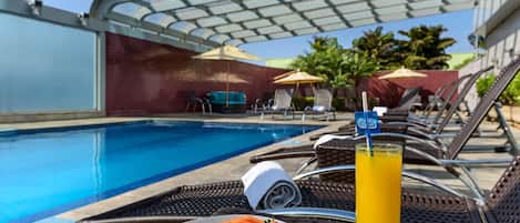 Outdoor pool, sun loungers