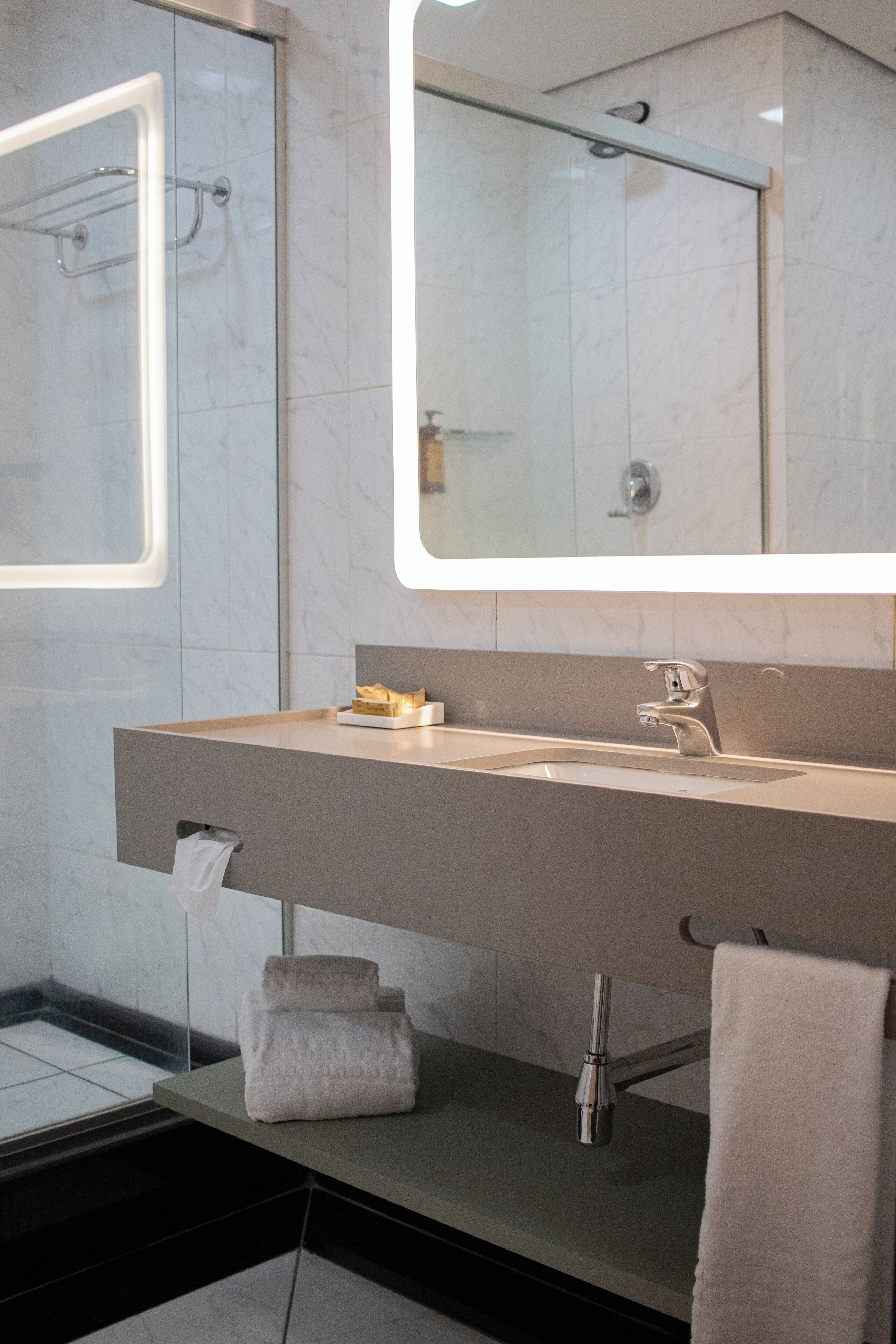 standard room, 2 queen beds | bathroom | shower, eco-friendly toiletries, hair dryer, towels