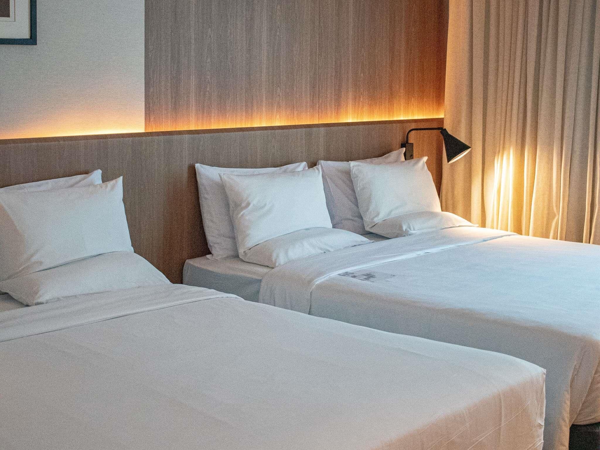 Standard Room, 2 Queen Beds | Minibar, in-room safe, desk, blackout drapes