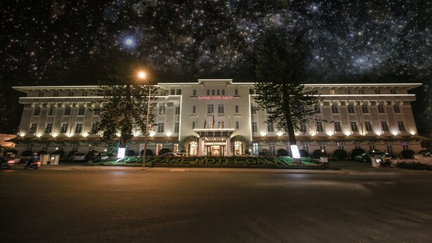 A large hotel with a prominent entrance and a sign reading "DU PARC HOTEL DALAT". - Du Parc Hotel Dalat (Xuan Huong - Da Lat)