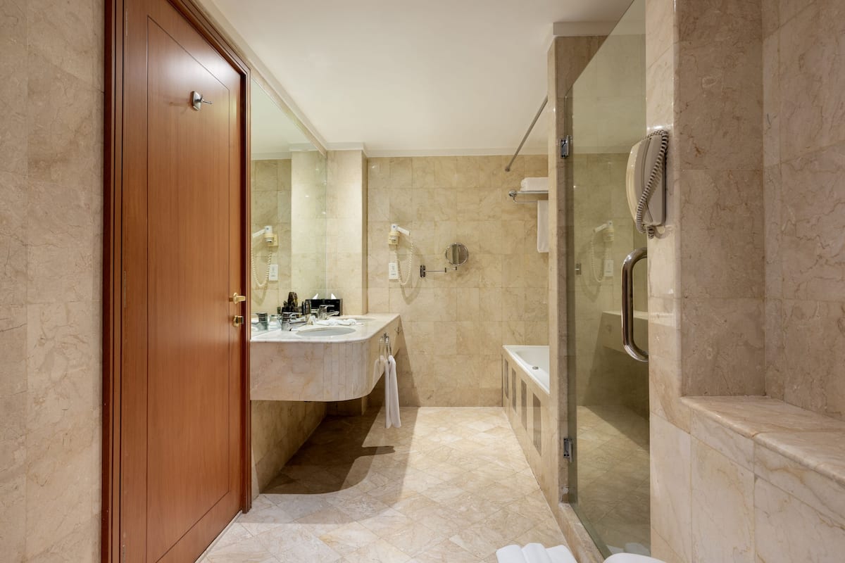 free toiletries, hair dryer, slippers, towels