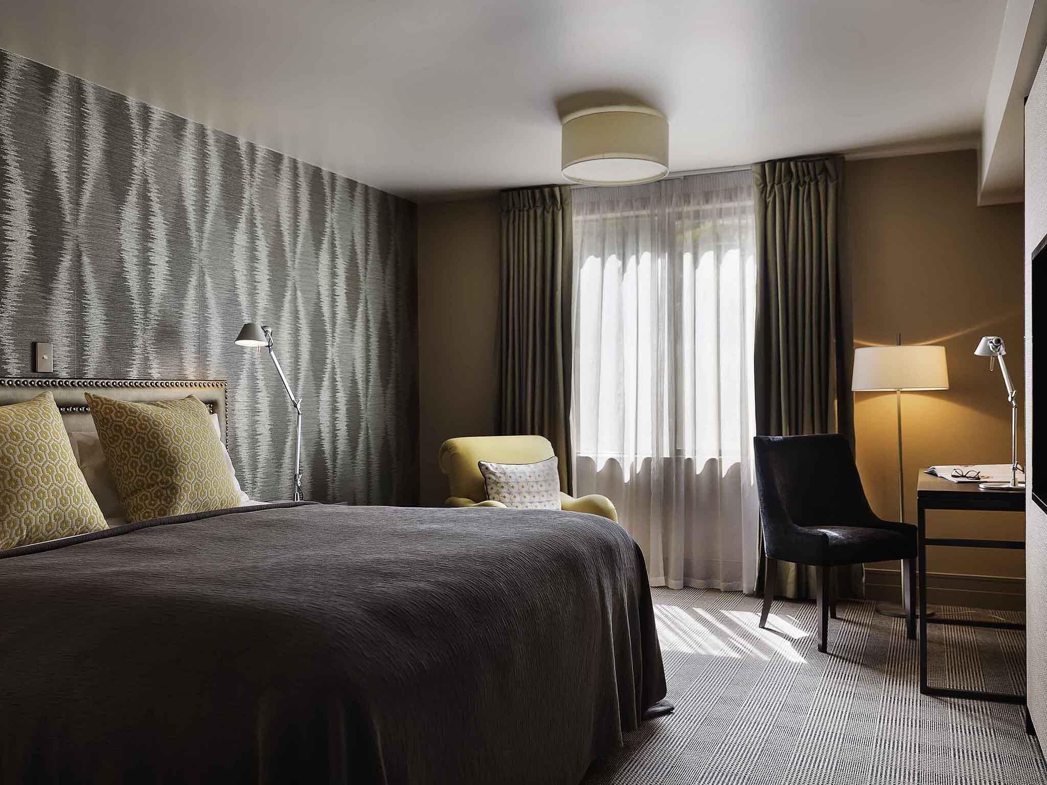 Premium bedding, down comforters, in-room safe, laptop workspace