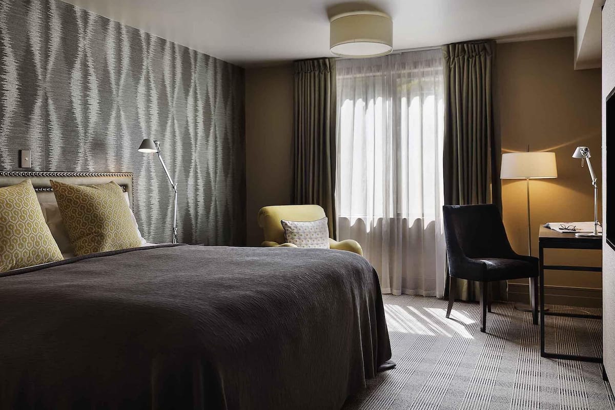 Premium bedding, down comforters, in-room safe, laptop workspace