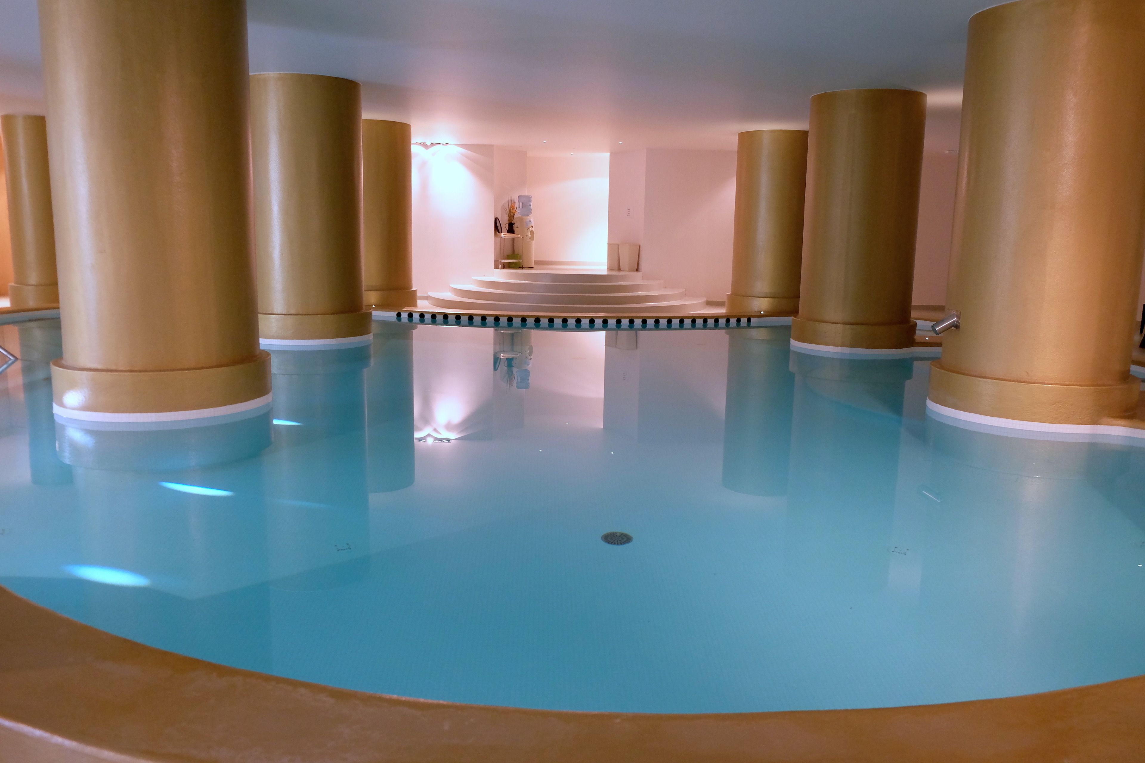 indoor pool, outdoor pool, pool umbrellas