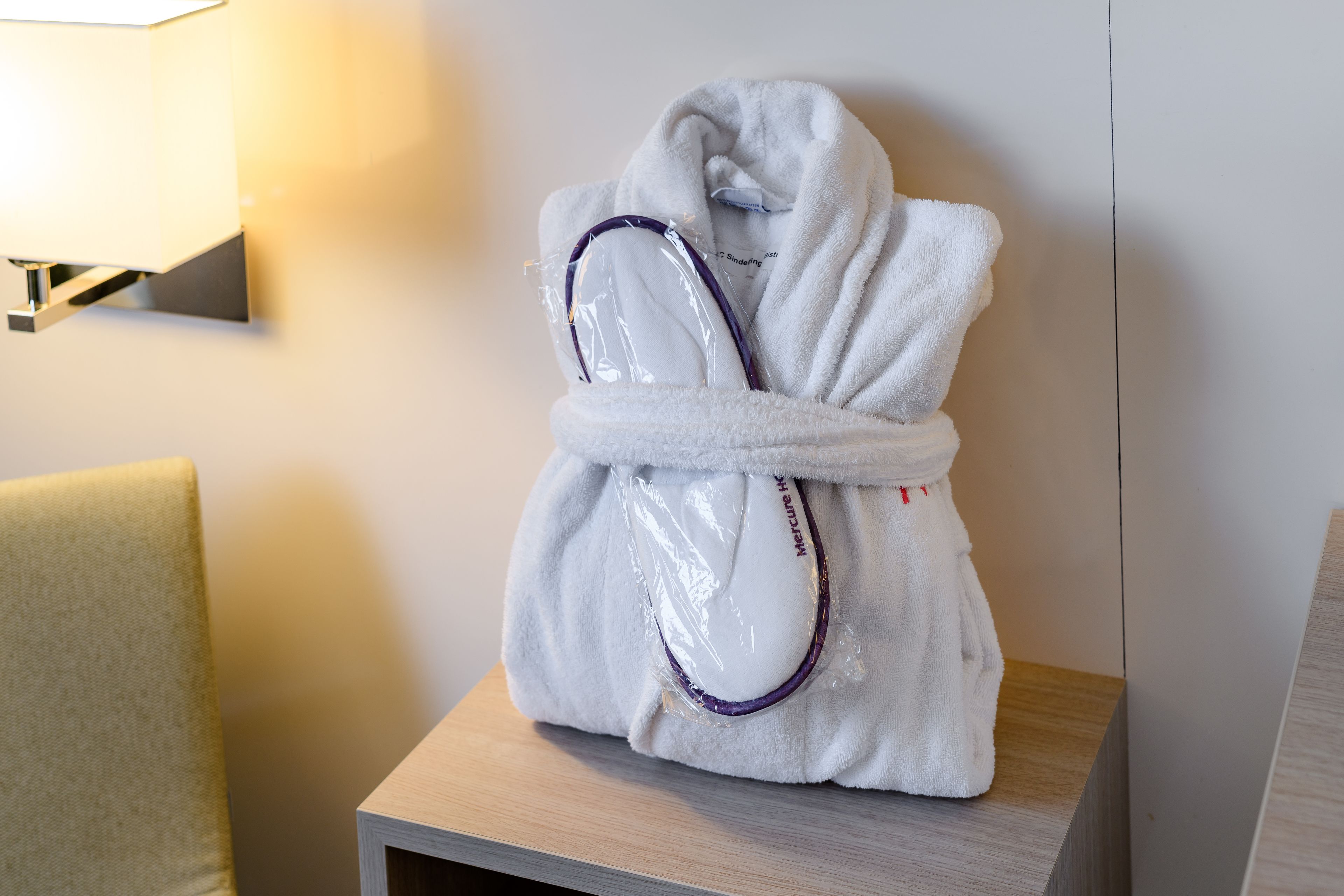 eco-friendly toiletries, hair dryer, towels