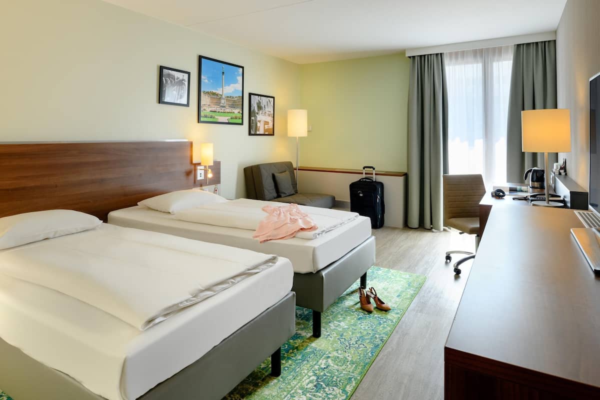 Standard Room | In-room safe, desk, laptop workspace, blackout curtains