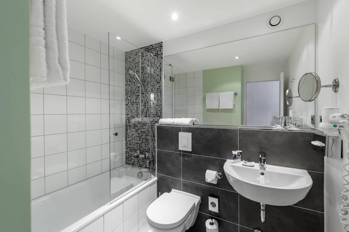 standard room | in-room safe, desk, laptop workspace, blackout curtains