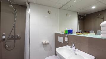 Shower, rainfall showerhead, hair dryer, towels