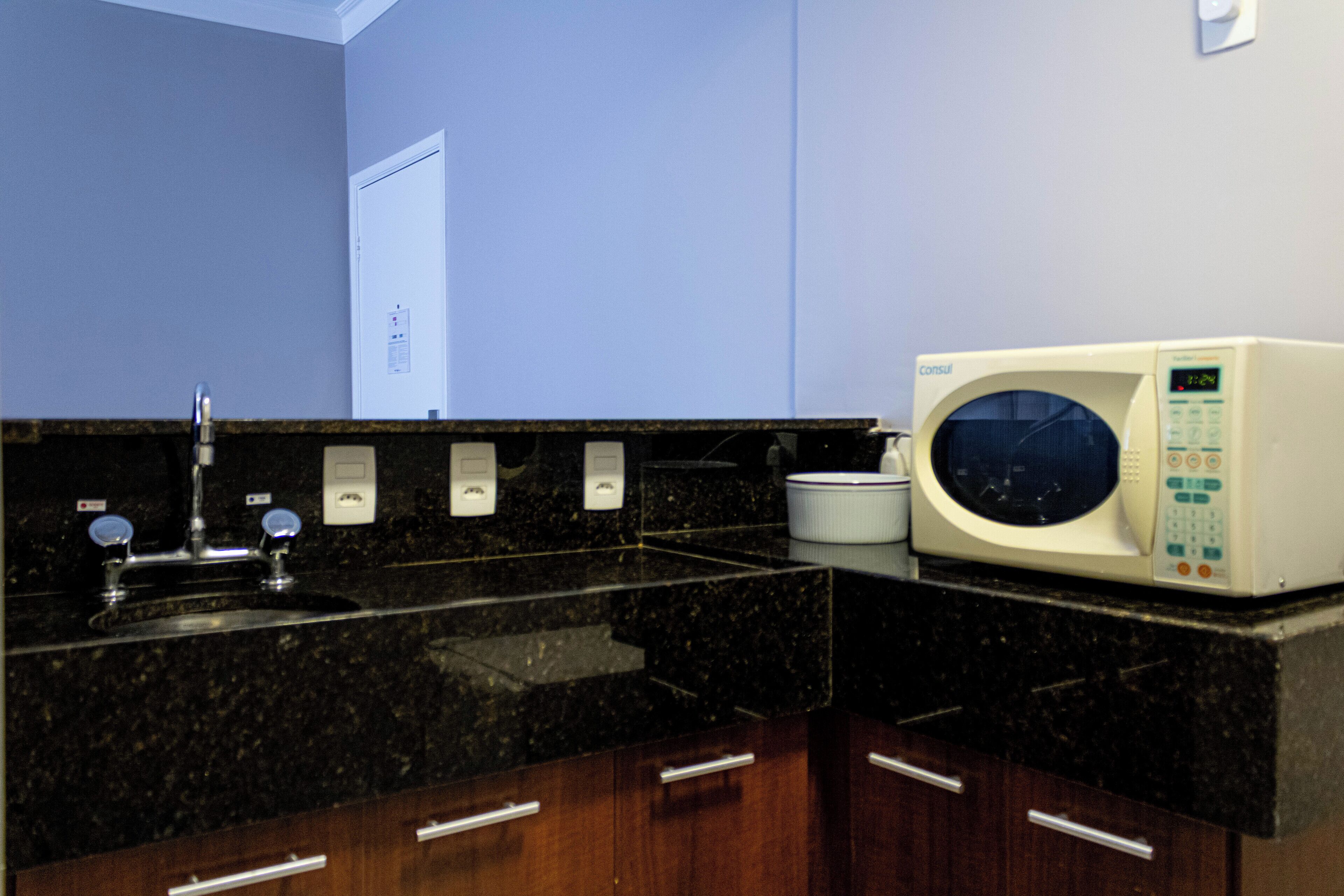 family room | private kitchen | microwave, cookware/dishes/utensils