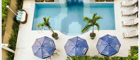 Outdoor pool, pool umbrellas, sun loungers