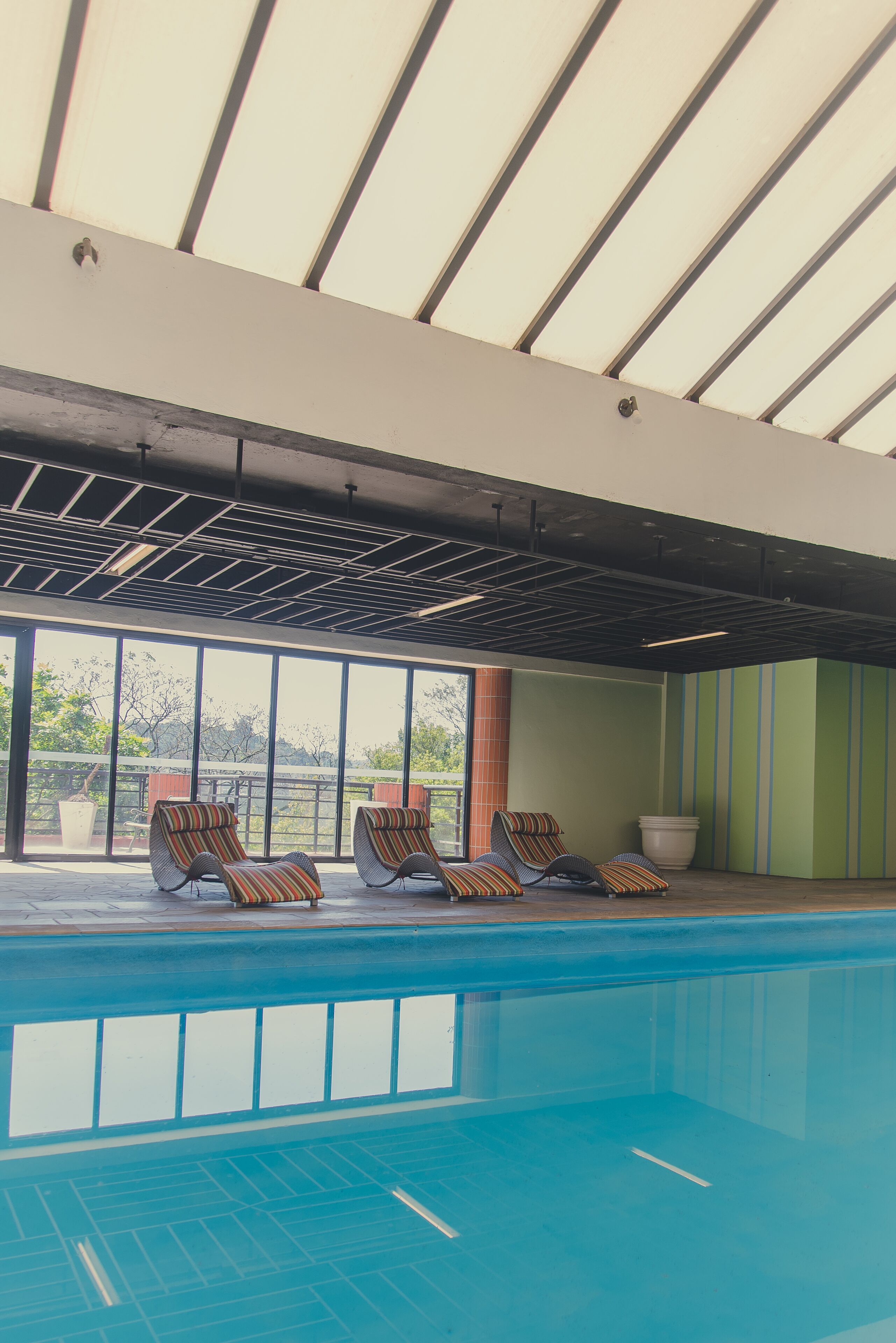indoor pool, pool loungers