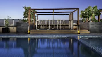 Outdoor pool, open 6:30 AM to 10:00 PM, free cabanas, pool umbrellas