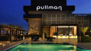 Outdoor pool, open 6:30 AM to 10:00 PM, free cabanas, pool umbrellas