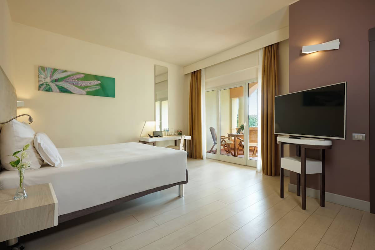 Kamar Double Standar, pemandangan kebun | 1 kamar tidur, seprai premium, selimut bulu angsa, dan minibar