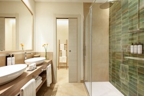 Family Quadruple Room, 2 Queen Beds, Garden View | Bathroom | Separate tub and shower, rainfall showerhead, designer toiletries - Almar Timi Ama Villasimius (Villasimius)
