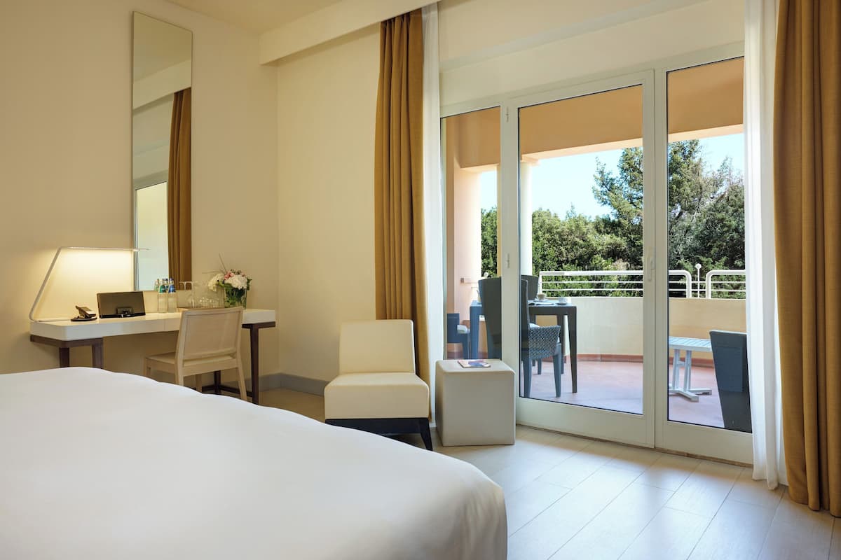 standard triple room, garden view | 1 bedroom, premium bedding, down duvets, minibar