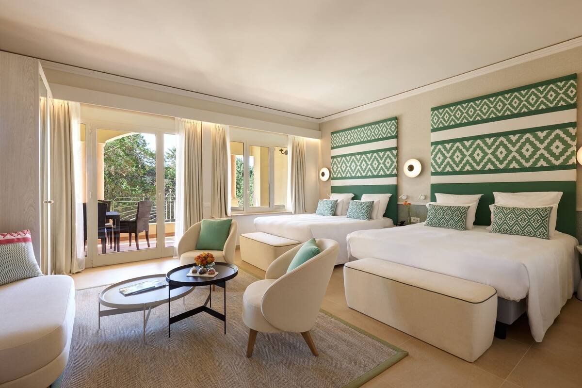 Family Quadruple Room, 2 Queen Beds, Garden View | Premium bedding, down comforters, minibar, in-room safe