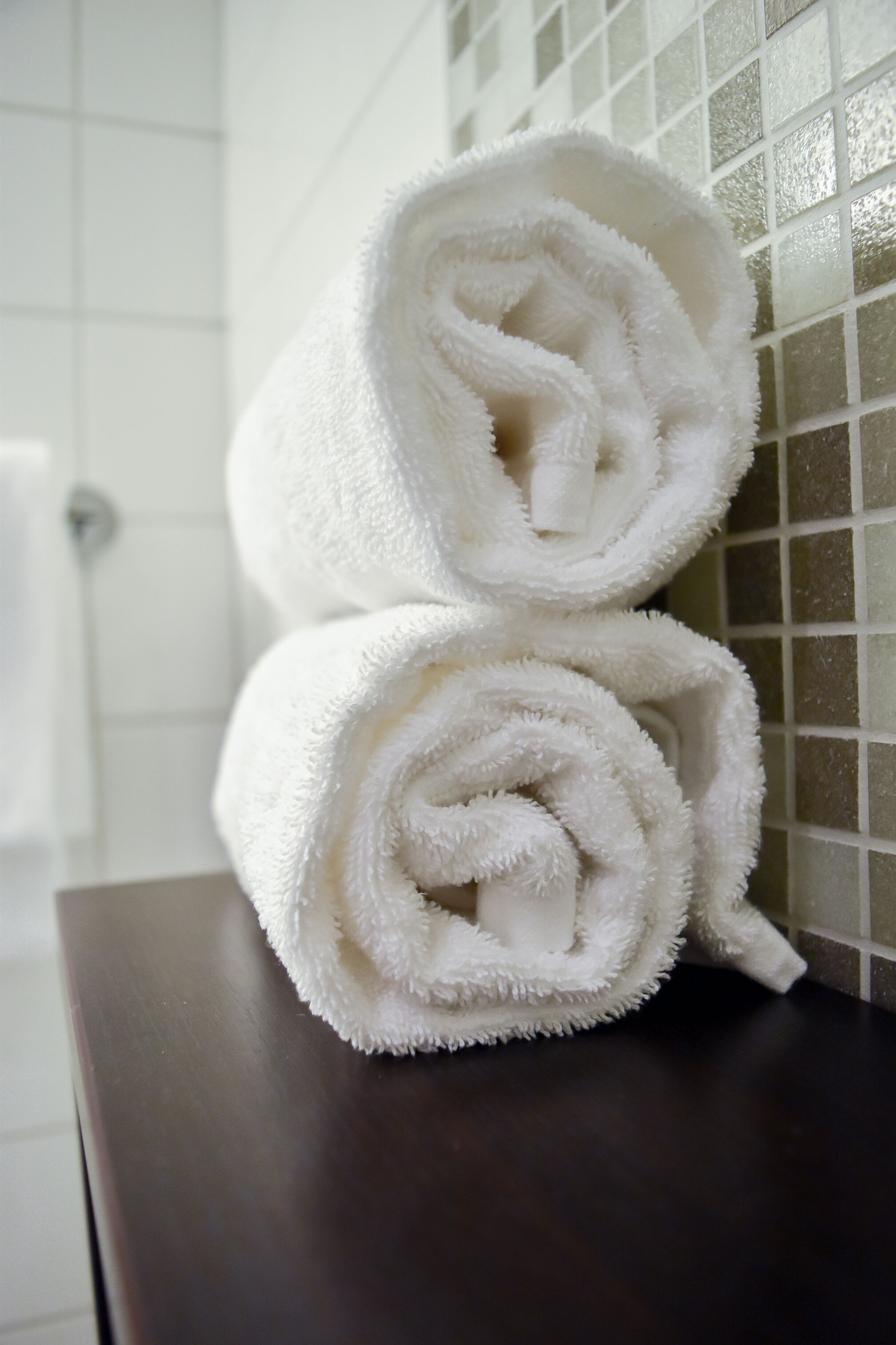 shower, eco-friendly toiletries, towels