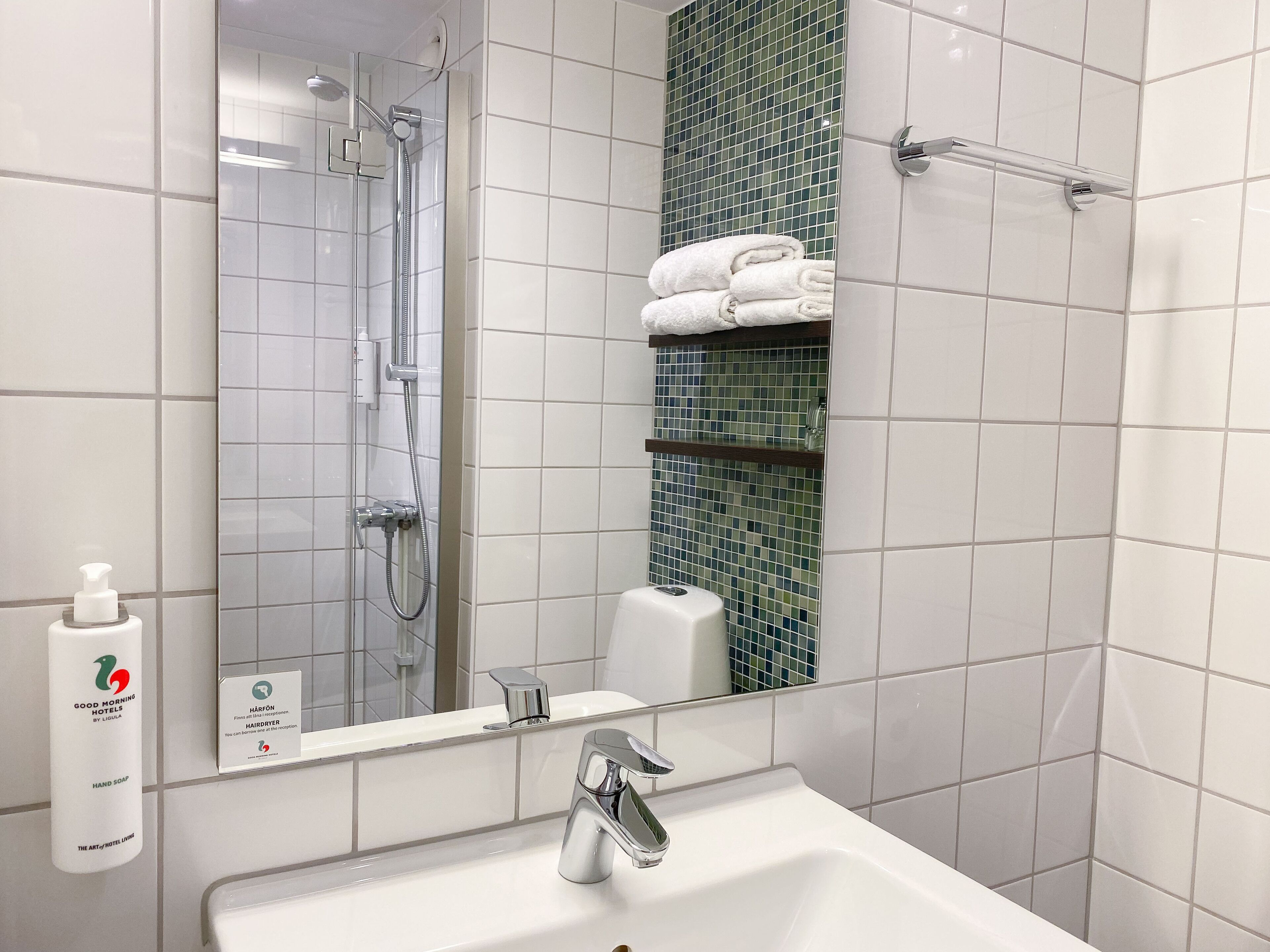 shower, eco-friendly toiletries, towels