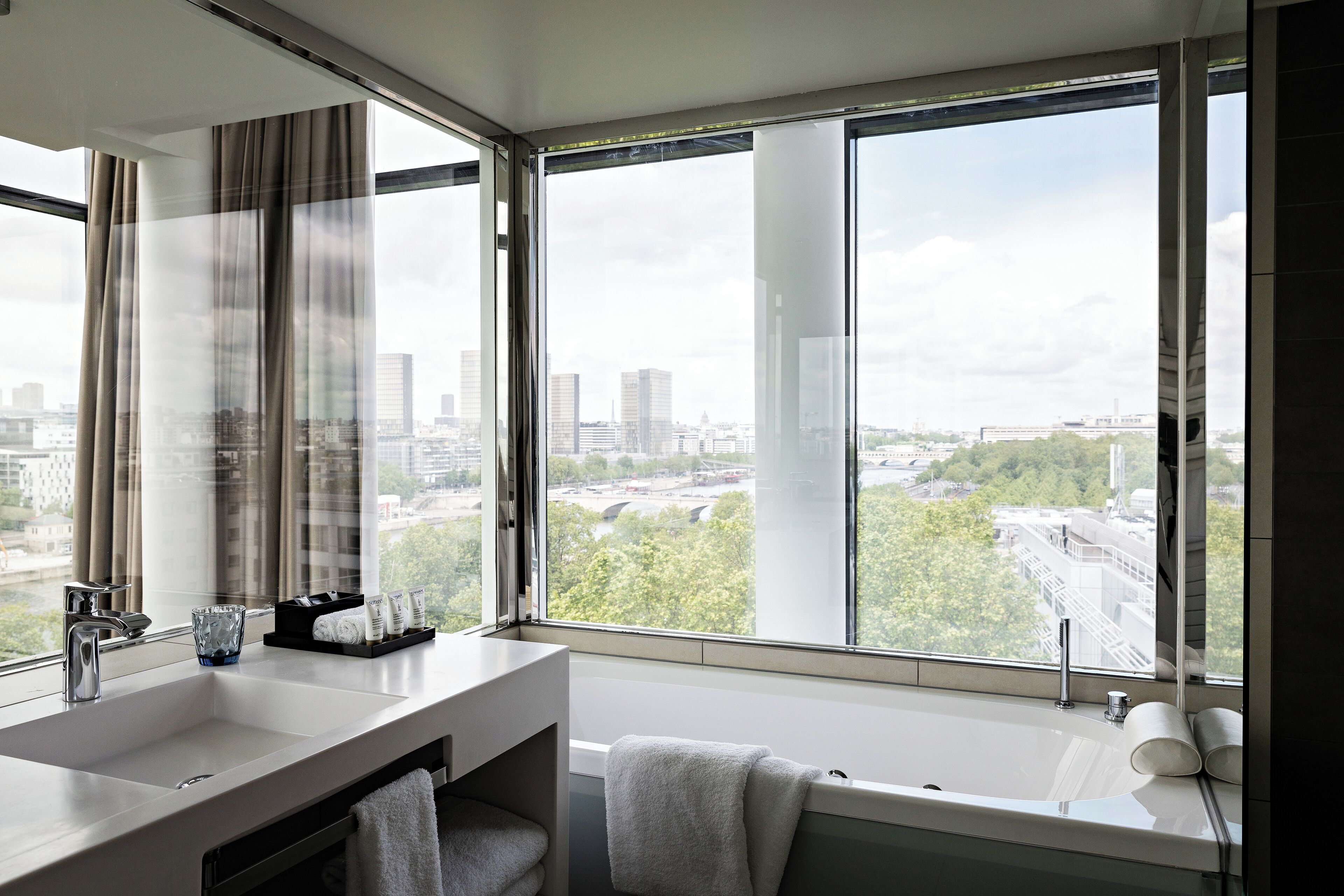 presidential suite, multiple beds | bathroom | eco-friendly toiletries, hair dryer, bathrobes, slippers