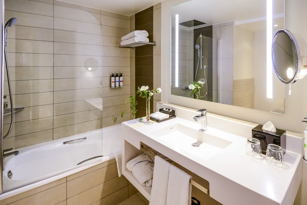 eco-friendly toiletries, hair dryer, bathrobes, slippers