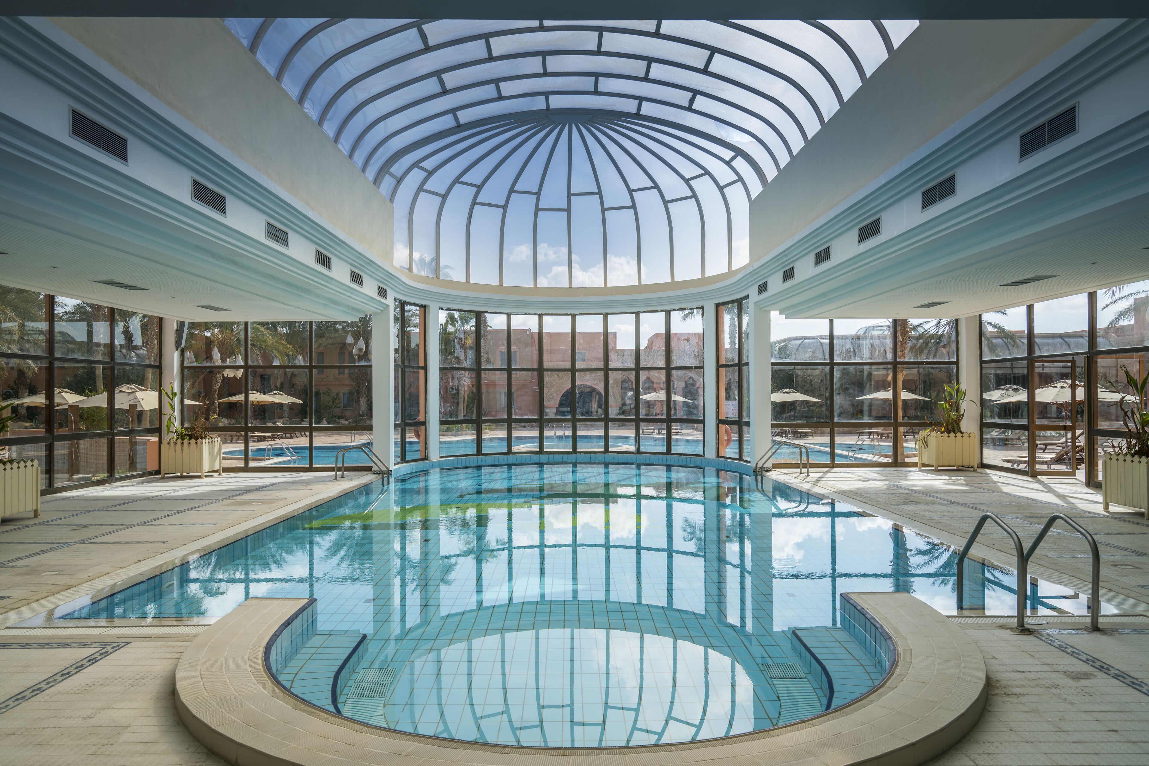 indoor pool, outdoor pool, pool loungers