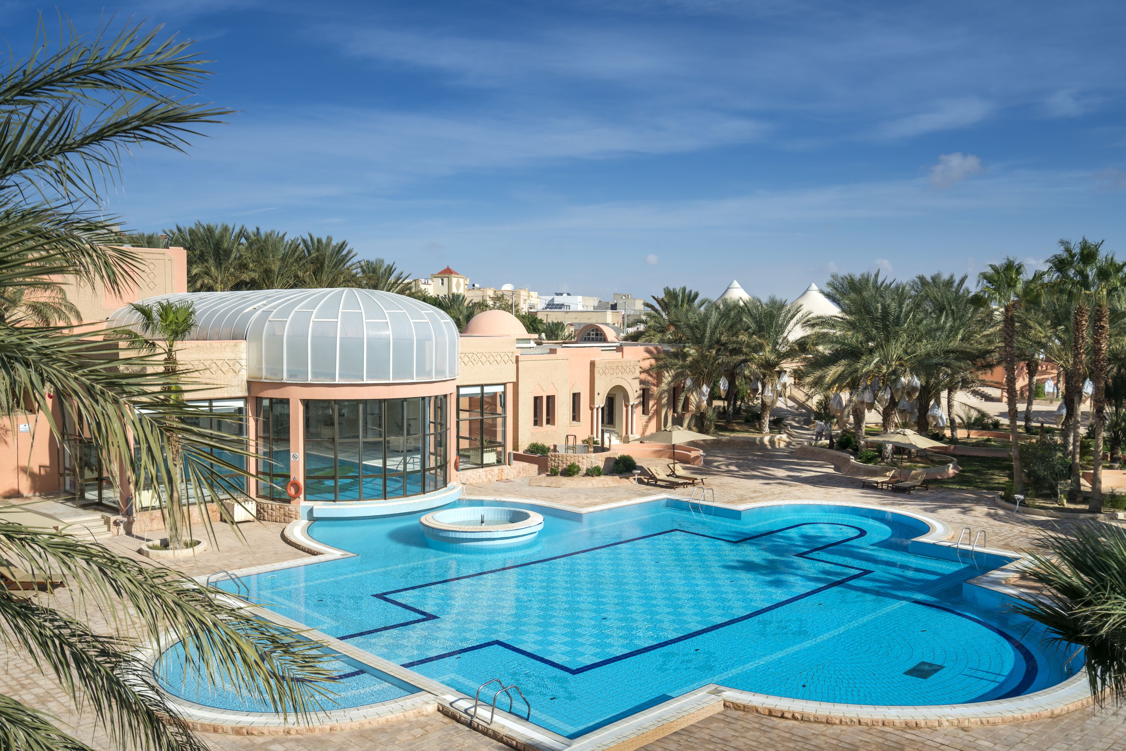 indoor pool, outdoor pool, pool loungers