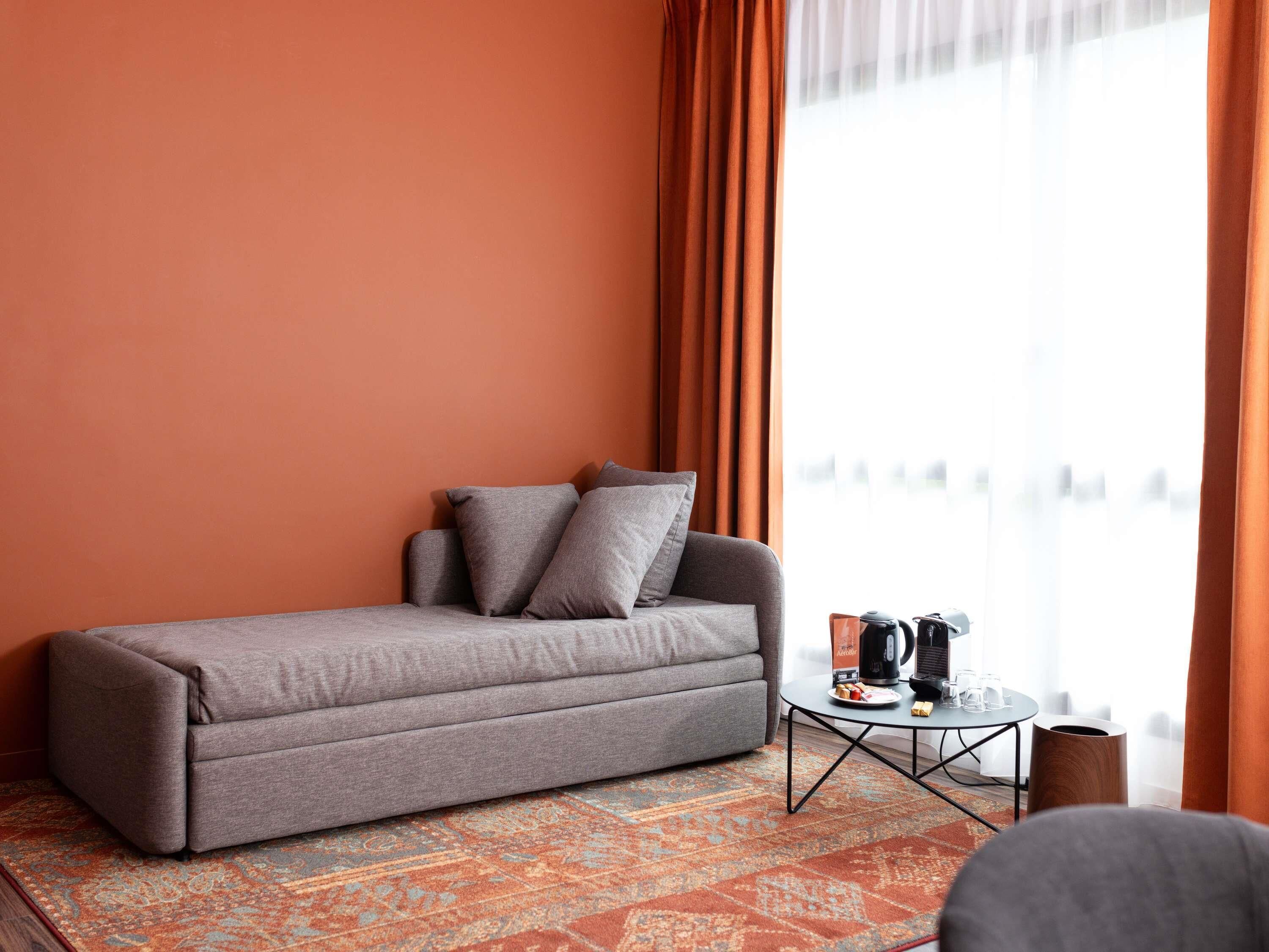 Superior suite, 1 tweepersoonsbed met slaapbank | Luxe beddengoed, Select Comfort-bedden, een bureau