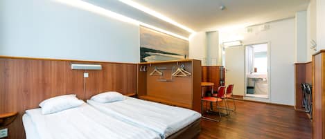 Blackout curtains, soundproofing, free WiFi, bed sheets