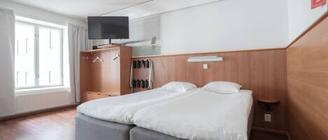 Blackout curtains, soundproofing, free WiFi, bed sheets