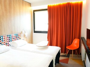 Luxe beddengoed, geluiddichte muren, een strijkplank/strijkijzer
