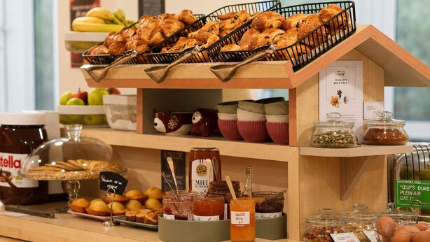 A breakfast buffet with pastries, jams, and condiments. - ibis Styles Caen Centre Historique (Caen)