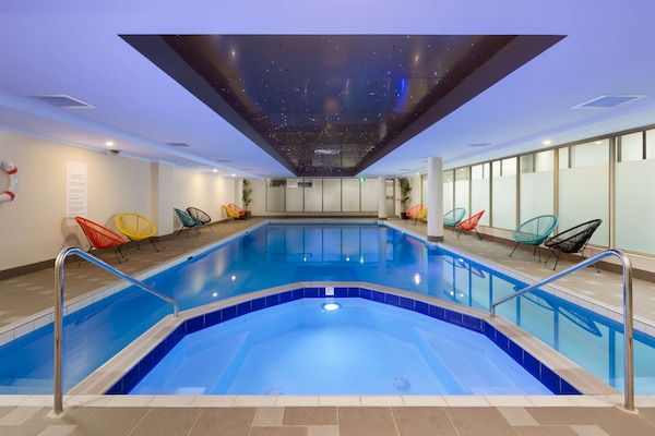 Indoor pool, open 6:00 AM to 10:00 PM, sun loungers