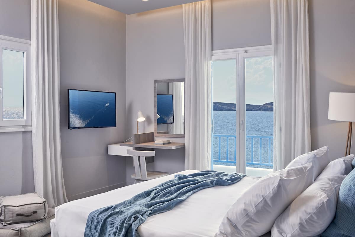 Suite Grand, vista al mar | 1 habitación y ropa de cama de alta calidad