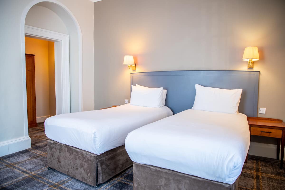 Twin Room | Desk, iron/ironing board, free cots/infant beds, rollaway beds