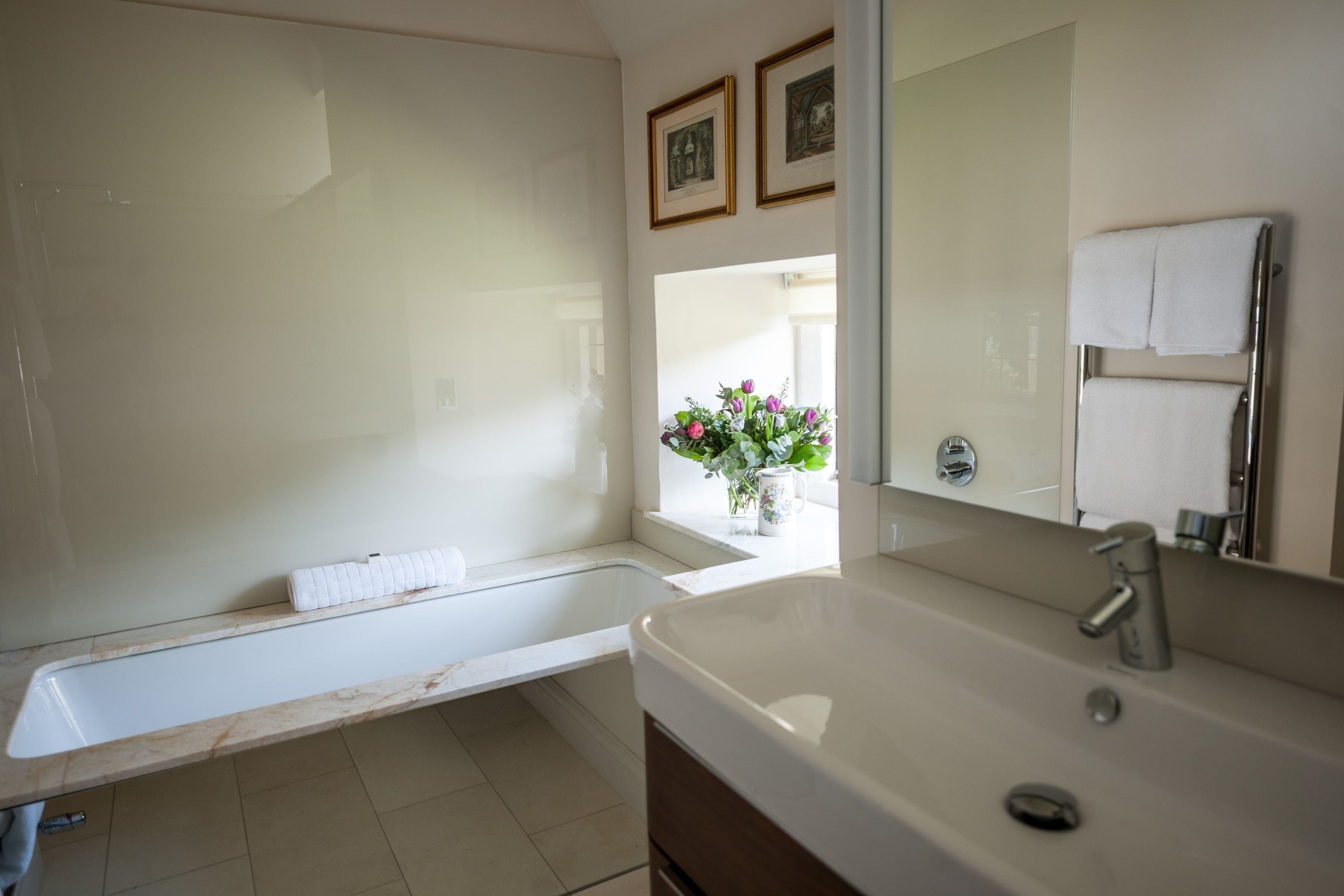 classic double room | bathroom | combined shower/bathtub, designer toiletries, hair dryer, bathrobes